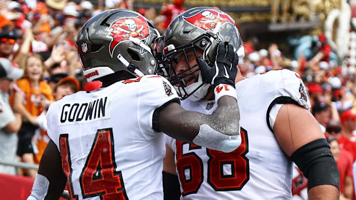Sep 22, 2024; Tampa, Florida, USA; Tampa Bay Buccaneers wide receiver Chris Godwin (14) celebrates with guard Ben Bredeson (68) Mandatory Credit: Kim Klement Neitzel-Imagn Images Sep 22, 2024; Tampa, Florida, USA; Tampa Bay Buccaneers wide receiver Chris Godwin (14) celebrates with guard Ben Bredeson (68) Mandatory Credit: Kim Klement Neitzel-Imagn Images