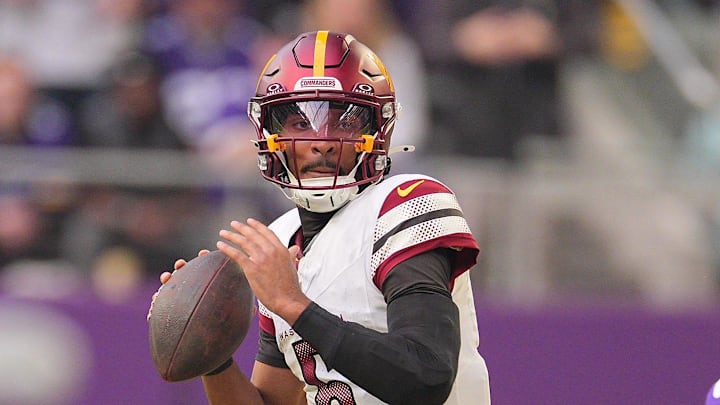 Dec 7, 2025; Minneapolis, Minnesota, USA; Washington Commanders quarterback Jayden Daniels (5) drops back to pass during the second half at U.S. Bank Stadium. Mandatory Credit: Brad Rempel-Imagn Images Dec 7, 2025; Minneapolis, Minnesota, USA; Washington Commanders quarterback Jayden Daniels (5) drops back to pass during the second half at U.S. Bank Stadium. Mandatory Credit: Brad Rempel-Imagn Images