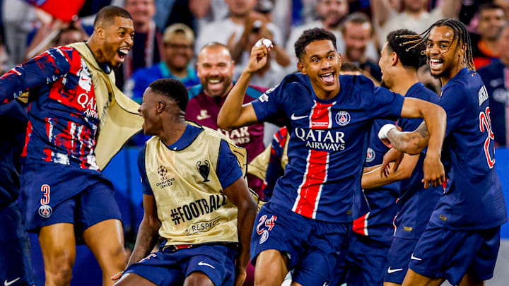 PSG run on to the field to celebrate Senny Mayulu's goal and their fifth overall of the night.