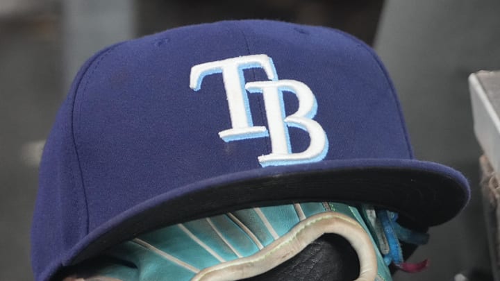 Sep 26, 2025; Toronto, Ontario, CAN; The hat and glove of Tampa Bay Rays third baseman Junior Caminero (13) in the dugout during the game against the Toronto Blue Jays at Rogers Centre. Sep 26, 2025; Toronto, Ontario, CAN; The hat and glove of Tampa Bay Rays third baseman Junior Caminero (13) in the dugout during the game against the Toronto Blue Jays at Rogers Centre.