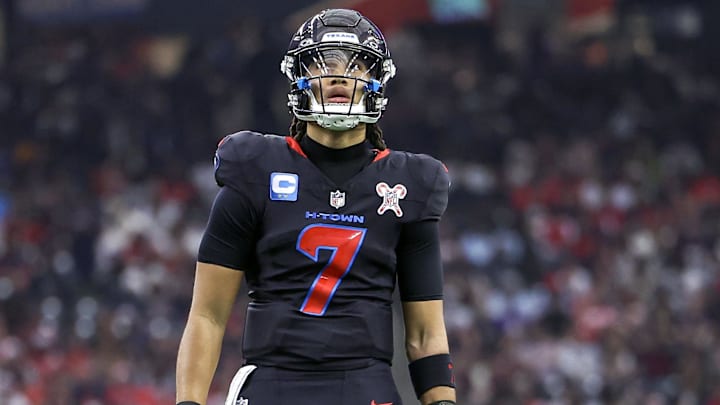 Dec 25, 2024; Houston, Texas, USA;  Houston Texans quarterback C.J. Stroud (7) reacts after a play during the game against the Baltimore Ravens at NRG Stadium. Mandatory Credit: Troy Taormina-Imagn Images
