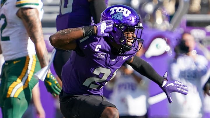 Oct 18, 2025; Fort Worth, Texas, USA; TCU Horned Frogs safety Bud Clark (21) reacts after sacking Baylor Bears quarterback Sawyer Robertson (13) during the second half of a game at Amon G. Carter Stadium. Mandatory Credit: Raymond Carlin III-Imagn Images