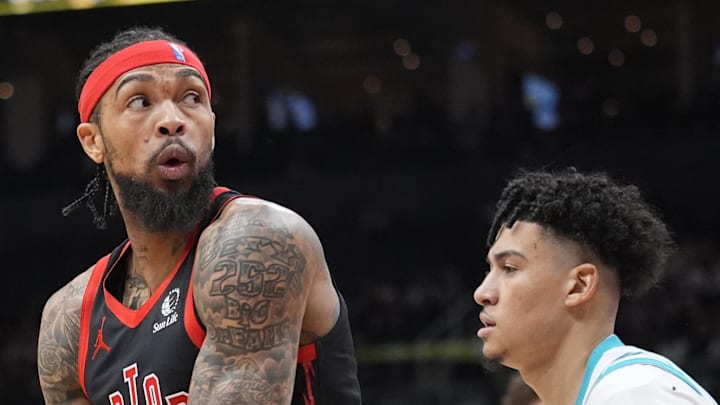 Toronto Raptors forward Brandon Ingram looks to make a play as Charlotte Hornets guard KJ Simpson defends. Toronto Raptors forward Brandon Ingram looks to make a play as Charlotte Hornets guard KJ Simpson defends.