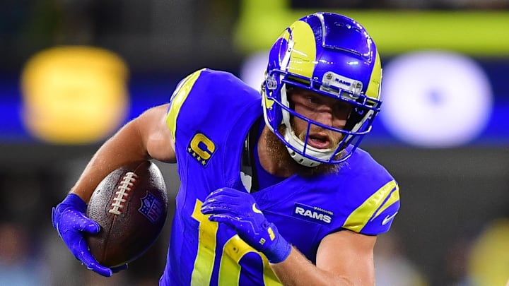 Nov 24, 2024; Inglewood, California, USA; Los Angeles Rams wide receiver Cooper Kupp (10) runs the ball against Philadelphia Eagles cornerback Cooper DeJean (33) during the second half at SoFi Stadium. Mandatory Credit: Gary A. Vasquez-Imagn Images