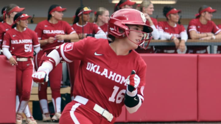 Oklahoma outfielder Abby Dayton hustles toward first against Kentucky at Love's Field.