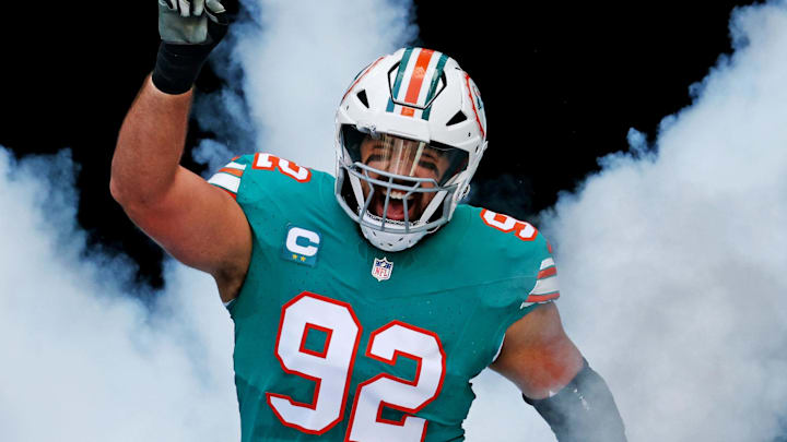 Dec 21, 2025; Miami Gardens, Florida, USA; Miami Dolphins defensive tackle Zach Sieler (92) runs on the field at the start of the game against the Cincinnati Bengals at Hard Rock Stadium. 