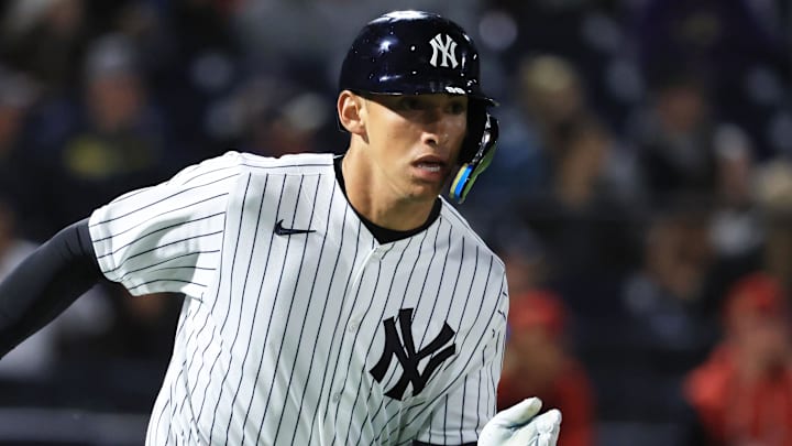 Feb 25, 2026; Tampa, Florida, USA; New York Yankees infielder George Lombard Jr (96) hits a two-RBI double during the fifth inning against the Washington Nationals at George M. Steinbrenner Field. Feb 25, 2026; Tampa, Florida, USA; New York Yankees infielder George Lombard Jr (96) hits a two-RBI double during the fifth inning against the Washington Nationals at George M. Steinbrenner Field.
