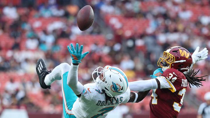 Miami Dolphins wide receiver Caleb Douglas, Washington Commanders cornerback Antonio Hamilton Sr. Miami Dolphins wide receiver Caleb Douglas, Washington Commanders cornerback Antonio Hamilton Sr.