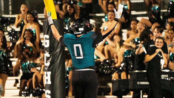 Gulf Coast running back Gio Marenco (0) scored six touchdowns and rushed for a school-record 411 yards in a 50-43 victory over Estero on Sept. 10, 2026. Gulf Coast running back Gio Marenco (0) scored six touchdowns and rushed for a school-record 411 yards in a 50-43 victory over Estero on Sept. 10, 2026.
