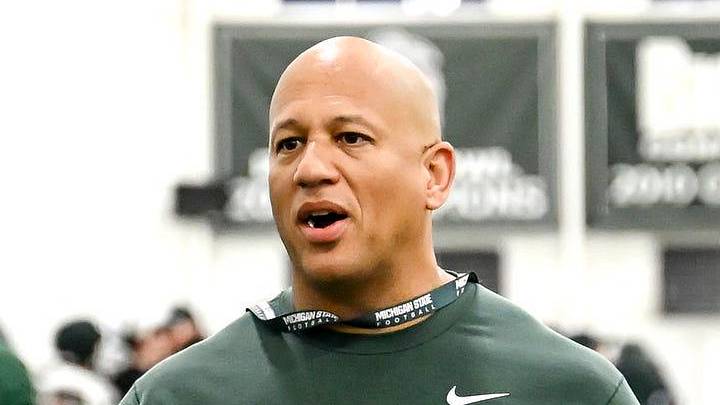 Michigan State's assistant head coach/special teams coordinator LeVar Woods talks with Tarik Ahmetbasic, left, and other on special teams during spring football practice on Tuesday, April 14, 2026, in East Lansing. Michigan State's assistant head coach/special teams coordinator LeVar Woods talks with Tarik Ahmetbasic, left, and other on special teams during spring football practice on Tuesday, April 14, 2026, in East Lansing.