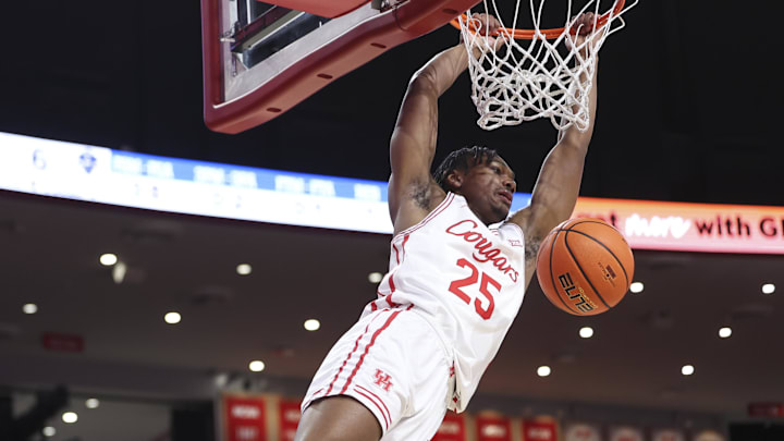 Dec 13, 2025; Houston, Texas, USA; Houston Cougars guard Mercy Miller (25) dunks the ball during the first half against the New Orleans Privateers at Fertitta Center. Mandatory Credit: Troy Taormina-Imagn Images Dec 13, 2025; Houston, Texas, USA; Houston Cougars guard Mercy Miller (25) dunks the ball during the first half against the New Orleans Privateers at Fertitta Center. Mandatory Credit: Troy Taormina-Imagn Images