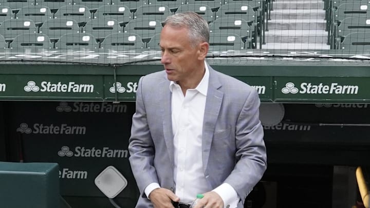 Apr 4, 2025; Chicago, Illinois, USA; Jed Hoyer President of the Chicago Cubs walks onto the field before a game against the San Diego Padres at Wrigley Field.