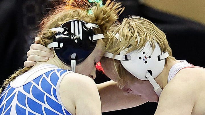 Nixa's Addison Harkins (right) is one of the Missouri's high school women's wrestlers you should know entering the 2025-2026 championship season.