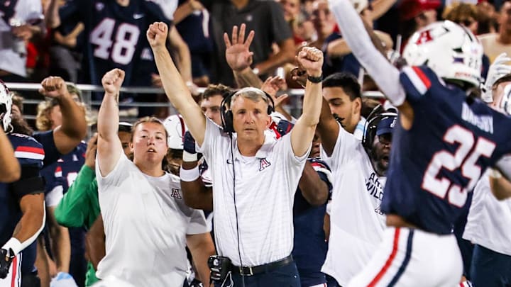 Sep 12, 2025; Tucson, Arizona, USA; Arizona Wildcats head coach Brent Brennan celebrates as defensive back Dalton Johnson (43) recovers the ball during the second quarter of the game against the Kansas State Wildcats at Arizona Stadium. Mandatory Credit: Aryanna Frank-Imagn Images Sep 12, 2025; Tucson, Arizona, USA; Arizona Wildcats head coach Brent Brennan celebrates as defensive back Dalton Johnson (43) recovers the ball during the second quarter of the game against the Kansas State Wildcats at Arizona Stadium. Mandatory Credit: Aryanna Frank-Imagn Images