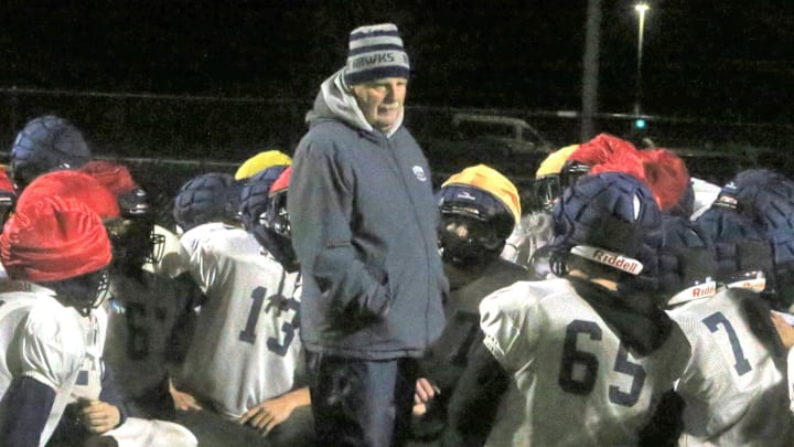 Exeter High School head football coach Bill Ball speaks to his team following practice Tuesday, Nov. 19, 2024. The Blue Hawks reached the NHIAA Division I semifinals.