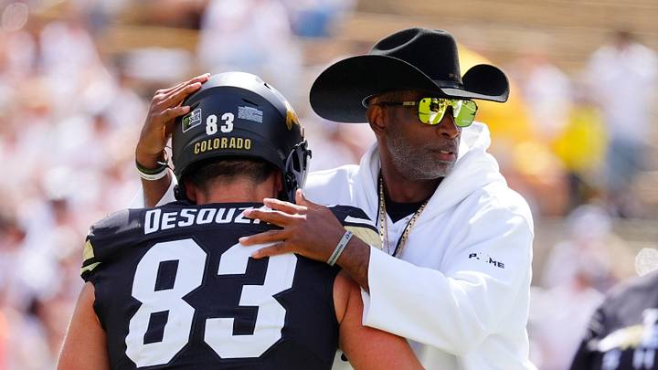 Sep 12, 2026; Boulder, Colorado, USA; Colorado Buffaloes tight end Zayne DeSouza (83) and head coach Deion Sanders before the game against Weber State at Folsom Field. Mandatory Credit: Ron Chenoy-Imagn Images Sep 12, 2026; Boulder, Colorado, USA; Colorado Buffaloes tight end Zayne DeSouza (83) and head coach Deion Sanders before the game against Weber State at Folsom Field. Mandatory Credit: Ron Chenoy-Imagn Images