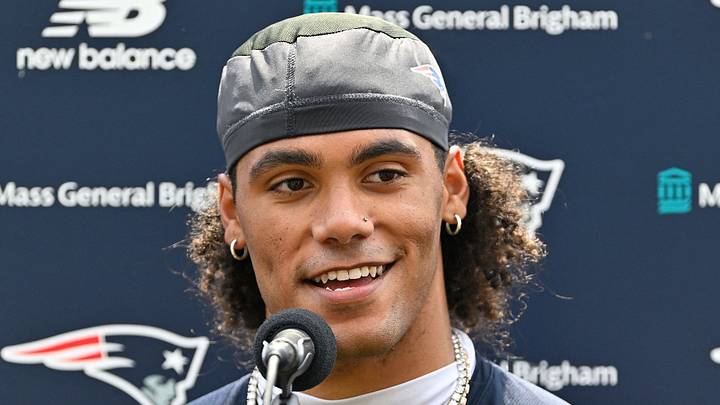 Jul 28, 2026; Foxborough, MA, USA; New England Patriots cornerback Christian Gonzalez (0) speaks to the media after practice at training camp at Gillette Stadium. Mandatory Credit: Eric Canha-Imagn Images