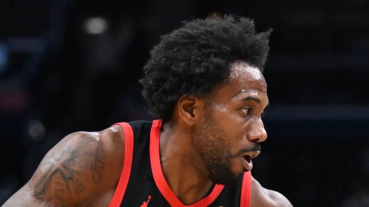 Toronto Raptors forward Kawhi Leonard dribbles as Washington Wizards center Felix Okpara defends. Toronto Raptors forward Kawhi Leonard dribbles as Washington Wizards center Felix Okpara defends.