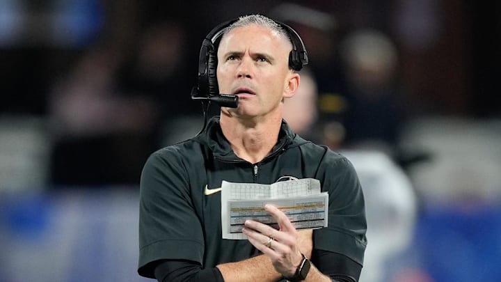 Dec 2, 2023; Charlotte, NC, USA; Florida State Seminoles head coach Mike Norvell walks the sidelines during the third quarter against the Louisville Cardinals at Bank of America Stadium. Mandatory Credit: Jim Dedmon-Imagn Images