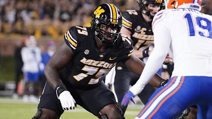 Nov 18, 2023; Columbia, Missouri, USA; Missouri Tigers offensive lineman Armand Membou (79) at the line of scrimmage against the Florida Gators during the game at Faurot Field at Memorial Stadium. Mandatory Credit: Denny Medley-Imagn Images