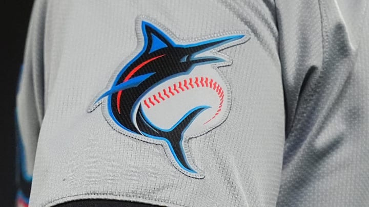 Aug 26, 2024; Denver, Colorado, USA; Detailed view of a Miami Marlins jersey emblem patch worn by Miami Marlins third base coach Griffin Benedict (81) during the sixth inning against the Colorado Rockies at Coors Field. Mandatory Credit: Ron Chenoy-Imagn Images