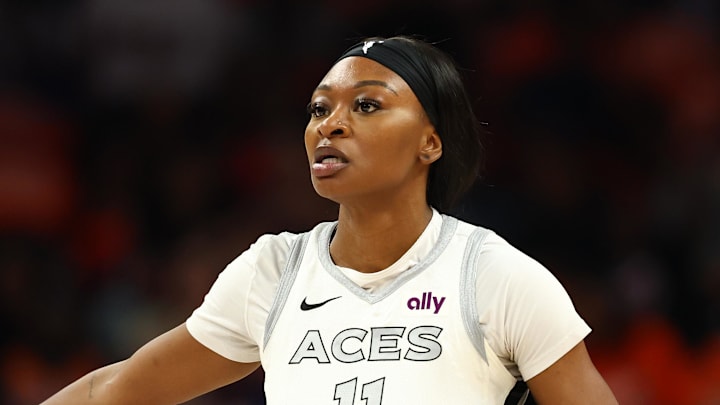 Oct 8, 2025; Phoenix, Arizona, USA; Las Vegas Aces guard Dana Evans (11) reacts against the Phoenix Mercury in the first half during game three of the 2025 WNBA Finals at PHX Arena. Mandatory Credit: Mark J. Rebilas-Imagn Images Oct 8, 2025; Phoenix, Arizona, USA; Las Vegas Aces guard Dana Evans (11) reacts against the Phoenix Mercury in the first half during game three of the 2025 WNBA Finals at PHX Arena. Mandatory Credit: Mark J. Rebilas-Imagn Images