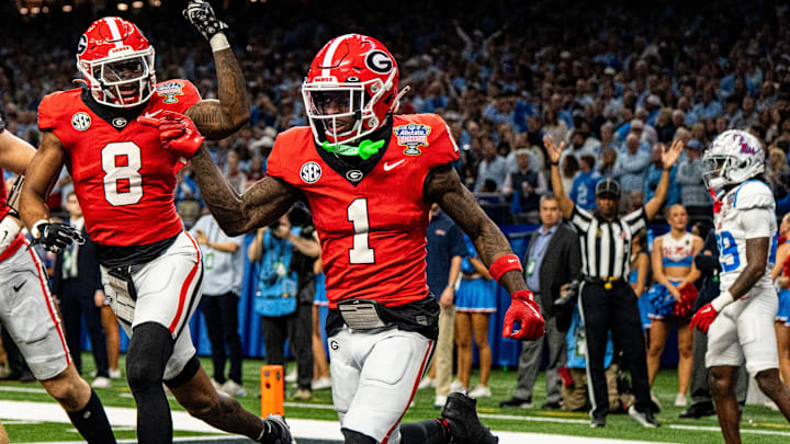 Georgia wide receiver Zachariah Branch (1) celebrates with wide receiver Colbie Young (8) after scoring a touchdown during the Sugar Bowl and College Football Playoff quarterfinals at Caesars Superdome in New Orleans, La., on Thursday, Jan. 1, 2026. Ole Miss defeated Georgia 39-34.