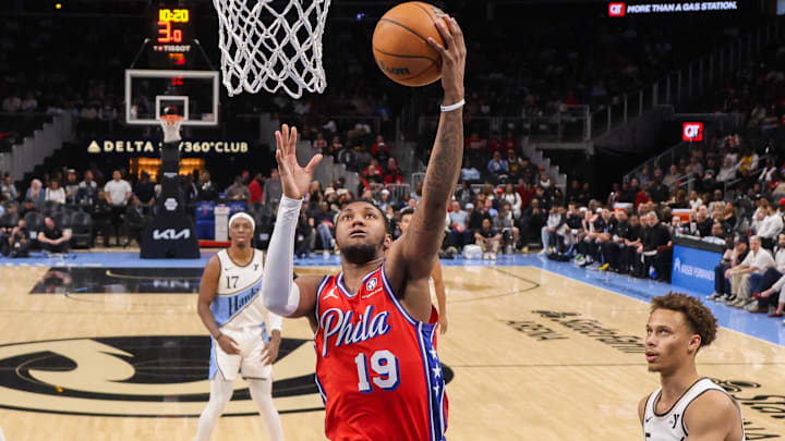 Mar 23, 2025; Atlanta, Georgia, USA; Philadelphia 76ers forward Justin Edwards (19) shoots against the Atlanta Hawks in the first half at State Farm Arena. Mandatory Credit: Brett Davis-Imagn Images Mar 23, 2025; Atlanta, Georgia, USA; Philadelphia 76ers forward Justin Edwards (19) shoots against the Atlanta Hawks in the first half at State Farm Arena. Mandatory Credit: Brett Davis-Imagn Images