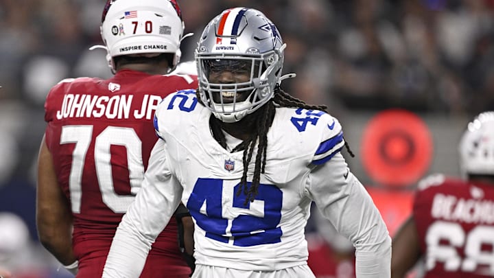 Nov 3, 2025; Arlington, Texas, USA; Dallas Cowboys defensive end Jadeveon Clowney (42) reacts after a sack against Arizona Cardinals quarterback Jacoby Brissett (7) in the first half at AT&T Stadium. Mandatory Credit: Jerome Miron-Imagn Images