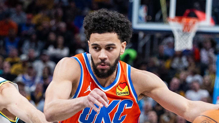 Dec 26, 2024; Indianapolis, Indiana, USA; Oklahoma City Thunder guard Ajay Mitchell (25) dribbles the ball while Indiana Pacers guard T.J. McConnell (9) defends in the second half at Gainbridge Fieldhouse. Mandatory Credit: Trevor Ruszkowski-Imagn Images Dec 26, 2024; Indianapolis, Indiana, USA; Oklahoma City Thunder guard Ajay Mitchell (25) dribbles the ball while Indiana Pacers guard T.J. McConnell (9) defends in the second half at Gainbridge Fieldhouse. Mandatory Credit: Trevor Ruszkowski-Imagn Images