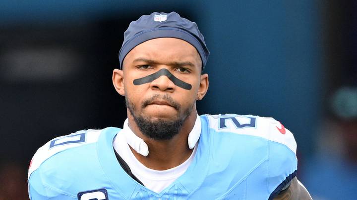 Tennessee Titans running back Tony Pollard (20) enters the field.