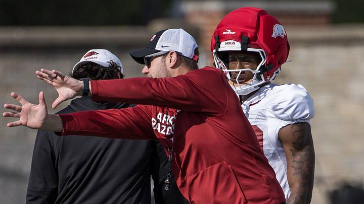 Arkansas Razorbacks coach Ryan Silverfield shows players a technique during spring practice at the Arkansas Razorbacks practice facilities. Arkansas Razorbacks coach Ryan Silverfield shows players a technique during spring practice at the Arkansas Razorbacks practice facilities.