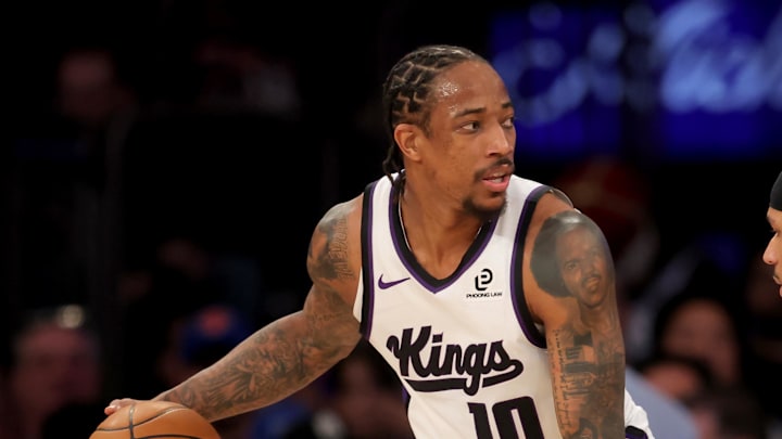 Jan 27, 2026; New York, New York, USA; Sacramento Kings guard DeMar DeRozan (10) controls the ball against New York Knicks guard Josh Hart (3) during the second quarter at Madison Square Garden.