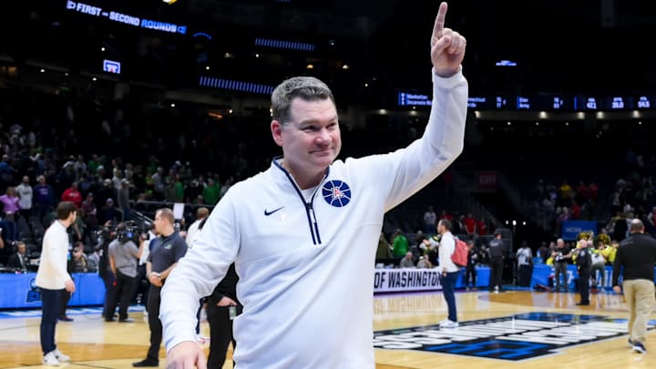 Mar 23, 2025; Seattle, WA, USA; Arizona Wildcats head coach Tommy Lloyd celebrates after defeating the Oregon Ducks at Climate Pledge Arena. Mandatory Credit: Stephen Brashear-Imagn Images Mar 23, 2025; Seattle, WA, USA; Arizona Wildcats head coach Tommy Lloyd celebrates after defeating the Oregon Ducks at Climate Pledge Arena. Mandatory Credit: Stephen Brashear-Imagn Images