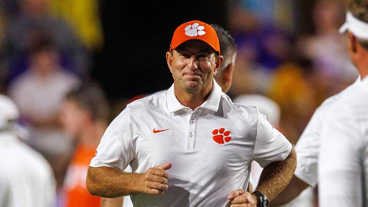 Sep 5, 2026; Baton Rouge, Louisiana, USA; Clemson Tigers head coach Dabo Swinney runs to greet LSU Tigers head coach Lane Kiffin before a game at Tiger Stadium. Mandatory Credit: Stephen Lew-Imagn Images Sep 5, 2026; Baton Rouge, Louisiana, USA; Clemson Tigers head coach Dabo Swinney runs to greet LSU Tigers head coach Lane Kiffin before a game at Tiger Stadium. Mandatory Credit: Stephen Lew-Imagn Images