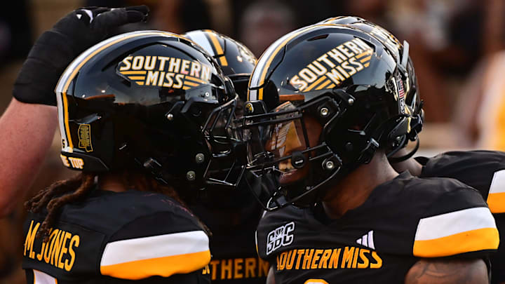 Southern Miss Golden Eagles running back Matt Jones (5) and running back Jeffery Pittman (0) react after a touchdown against the Jacksonville State Gamecocks during the first quarter at M.M. Roberts Stadium in Hattiesburg, Miss. on Sept. 27, 2025.