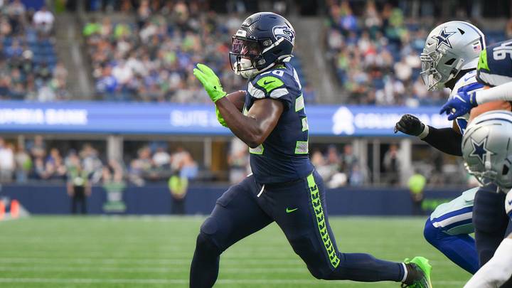 Aug 15, 2026; Seattle, Washington, USA; Seattle Seahawks running back TJ Harden (30) carries the ball against the Dallas Cowboys during the game at Lumen Field. Mandatory Credit: Steven Bisig-Imagn Images