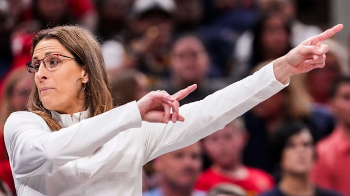Indiana Fever head coach Stephanie White points to the team’s side of the court Thursday, July 3, 2025, during a game between the Indiana Fever and the Las Vegas Aces at Gainbridge Fieldhouse in Indianapolis.