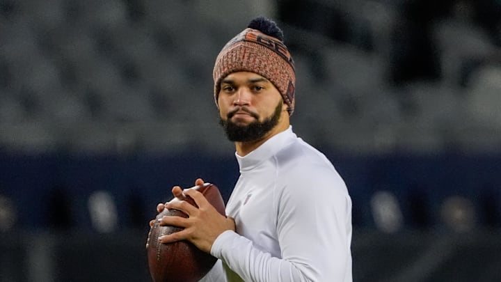 Jan 10, 2026; Chicago, IL, USA; Chicago Bears quarterback Caleb Williams (18) warms up prior to an NFC Wild Card Round game against the Green Bay Packers at Soldier Field. Mandatory Credit: David Banks-Imagn Images