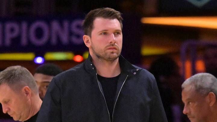 May 9, 2026; Los Angeles, California, USA; Los Angeles Lakers guard Luka Doncic (77) looks on from the bench in the final minutes of game three of the second round of the 2026 NBA Playoffs against the Oklahoma City Thunder at Crypto.com Arena. Mandatory Credit: Jayne Kamin-Oncea-Imagn Images