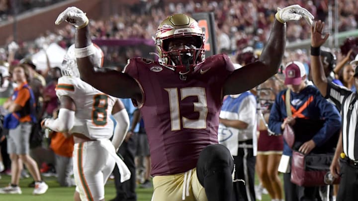 Oct 4, 2025; Tallahassee, Florida, USA; Florida State Seminoles tight end Randy Pittman Jr. (13) celebrates after scoring a touchdown during the second half against the Miami Hurricanes at Doak S. Campbell Stadium. Mandatory Credit: Robert Myers-Imagn Images Oct 4, 2025; Tallahassee, Florida, USA; Florida State Seminoles tight end Randy Pittman Jr. (13) celebrates after scoring a touchdown during the second half against the Miami Hurricanes at Doak S. Campbell Stadium. Mandatory Credit: Robert Myers-Imagn Images