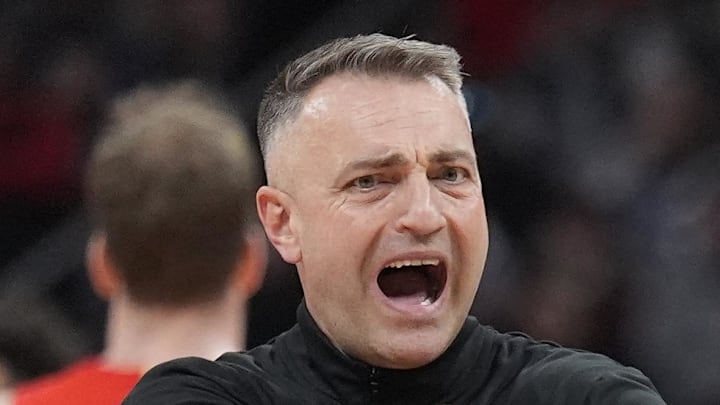 Toronto Raptors head coach Darko Rajakovic reacts to a call in favour of the Detroit Pistons.