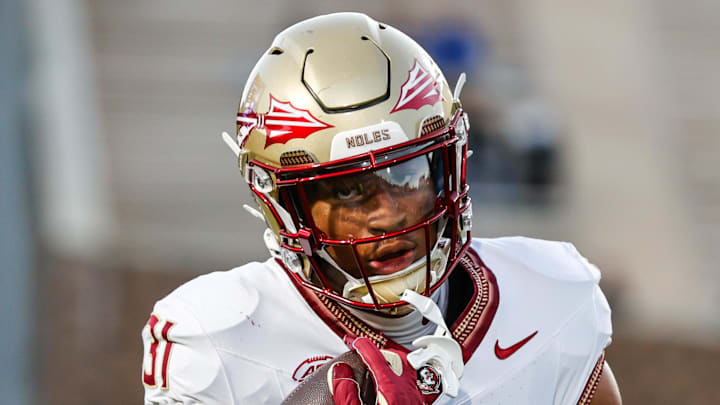 Oct 18, 2024; Durham, North Carolina, USA;  Florida State Seminoles linebacker DeMarco Ward (31) runs with the football prior to the first half of the game against Duke Blue Devils at Wallace Wade Stadium. Mandatory Credit: Jaylynn Nash-Imagn Images