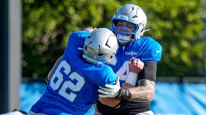 Detroit Lions center Cade Mays (64), right, practices with guard Michael Niese (62) during training camp Detroit Lions center Cade Mays (64), right, practices with guard Michael Niese (62) during training camp