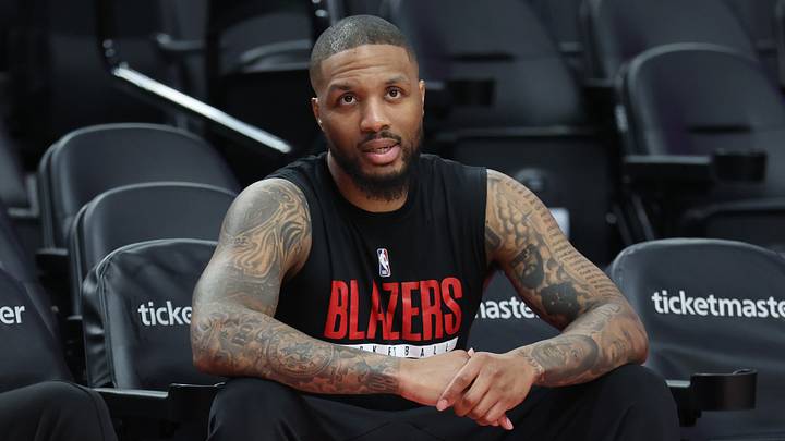 Apr 10, 2026; Portland, Oregon, USA;  Portland Trail Blazers guard Damian Lillard (0) watches his teammates during warm ups before the Trail Blazers play against the LA Clippers at Moda Center. Mandatory Credit: Jaime Valdez-Imagn Images