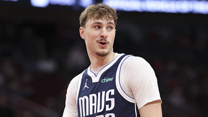 Jan 31, 2026; Houston, Texas, USA; Dallas Mavericks forward Cooper Flagg (32) smiles after a play during the third quarter against the Houston Rockets at Toyota Center. Mandatory Credit: Troy Taormina-Imagn Images