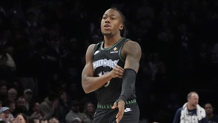 Feb 8, 2026; Minneapolis, Minnesota, USA; Minnesota Timberwolves guard Ayo Dosunmu (13) enters the game for the first time as a member of the team and receives a standing ovation as he readies to play the Los Angeles Clippers in the first quarter at Target Center. Mandatory Credit: Bruce Kluckhohn-Imagn Images