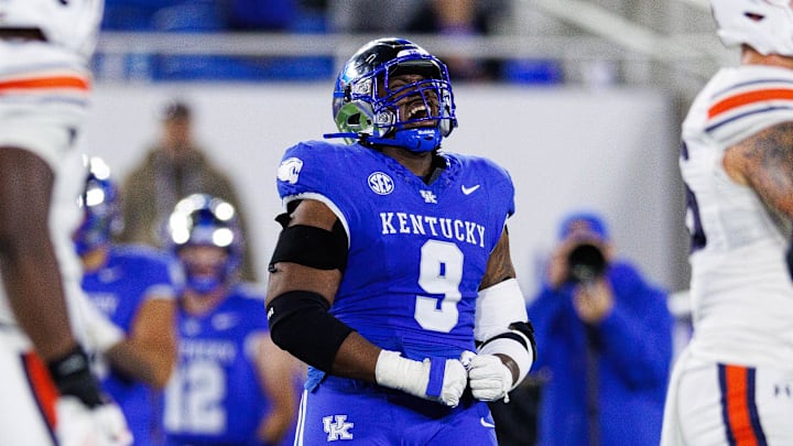 Oct 26, 2024; Lexington, Kentucky, USA; Kentucky Wildcats defensive lineman Keeshawn Silver (9) celebrates after a missed field goal by the Auburn Tigers during the third quarter at Kroger Field. Mandatory Credit: Jordan Prather-Imagn Images