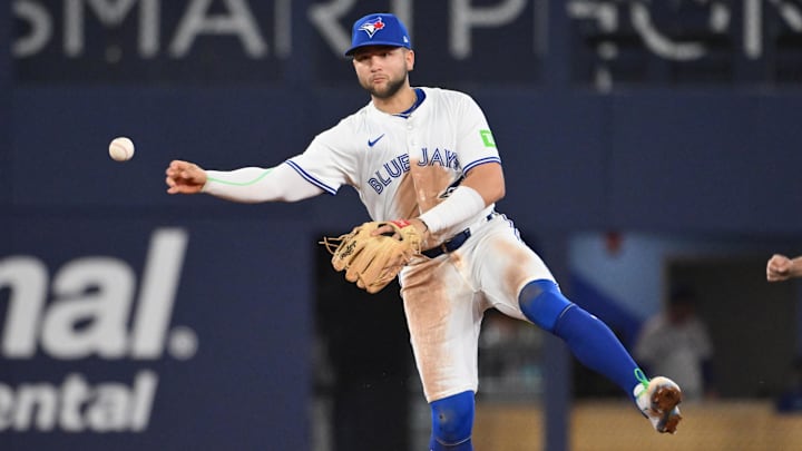 May 14, 2025; Toronto, Ontario, CAN;  Toronto Blue Jays shortstop Bo Bichette (11) throws out Tampa Bay Rays left fielder Chandler Simpson (not shown) in the fifth inning at Rogers Centre. 