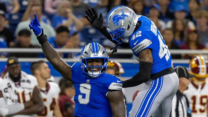 Aug 22, 2026; Detroit, Michigan, USA;  Detroit Lions defensive end Derrick Moore (9) celebrates his sack on Washington Commanders quarterback Sam Hartman (15) with cornerback Aamaris Brown (42) in the second quarter at Ford Field.  Mandatory Credit: David Reginek-Imagn Images